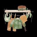 "Pregnant woman organizing baby clothes and preparing nursery as part of nesting instinct"